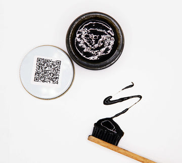 Natural home made toothpaste with charcoal xylitol baking soda and hydroxyapatite