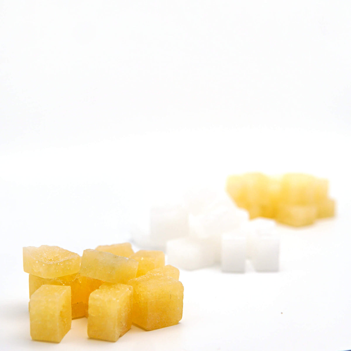 Close-up of Ora Flora xylitol mints in all three flavors